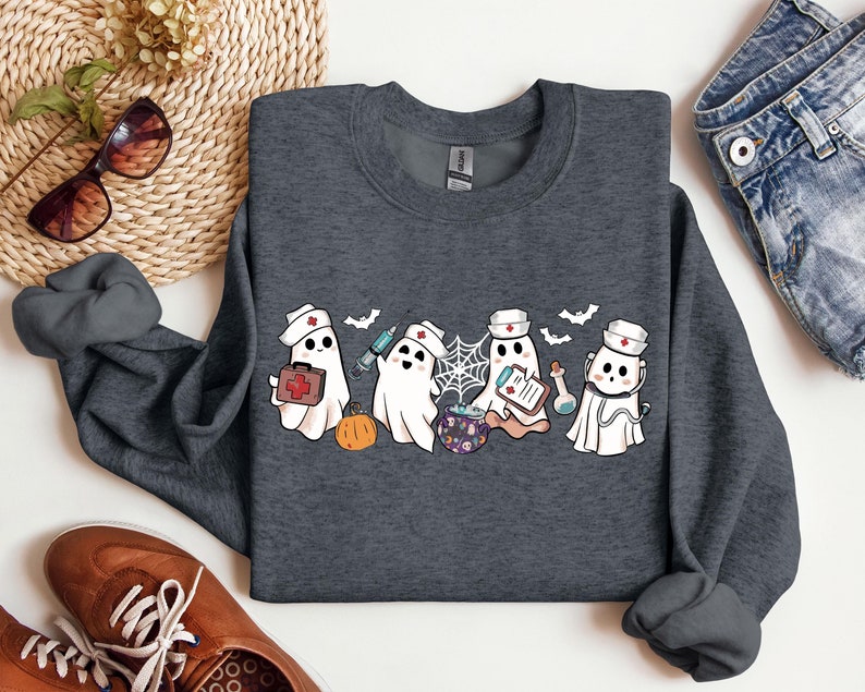 Ghost Nurse Halloween Sweatshirt, Halloween Nurse Shirt, Halloween Sweatshirt, Happy Halloween Shirt, Halloween Nurse Gift, Cute Nurse Shirt